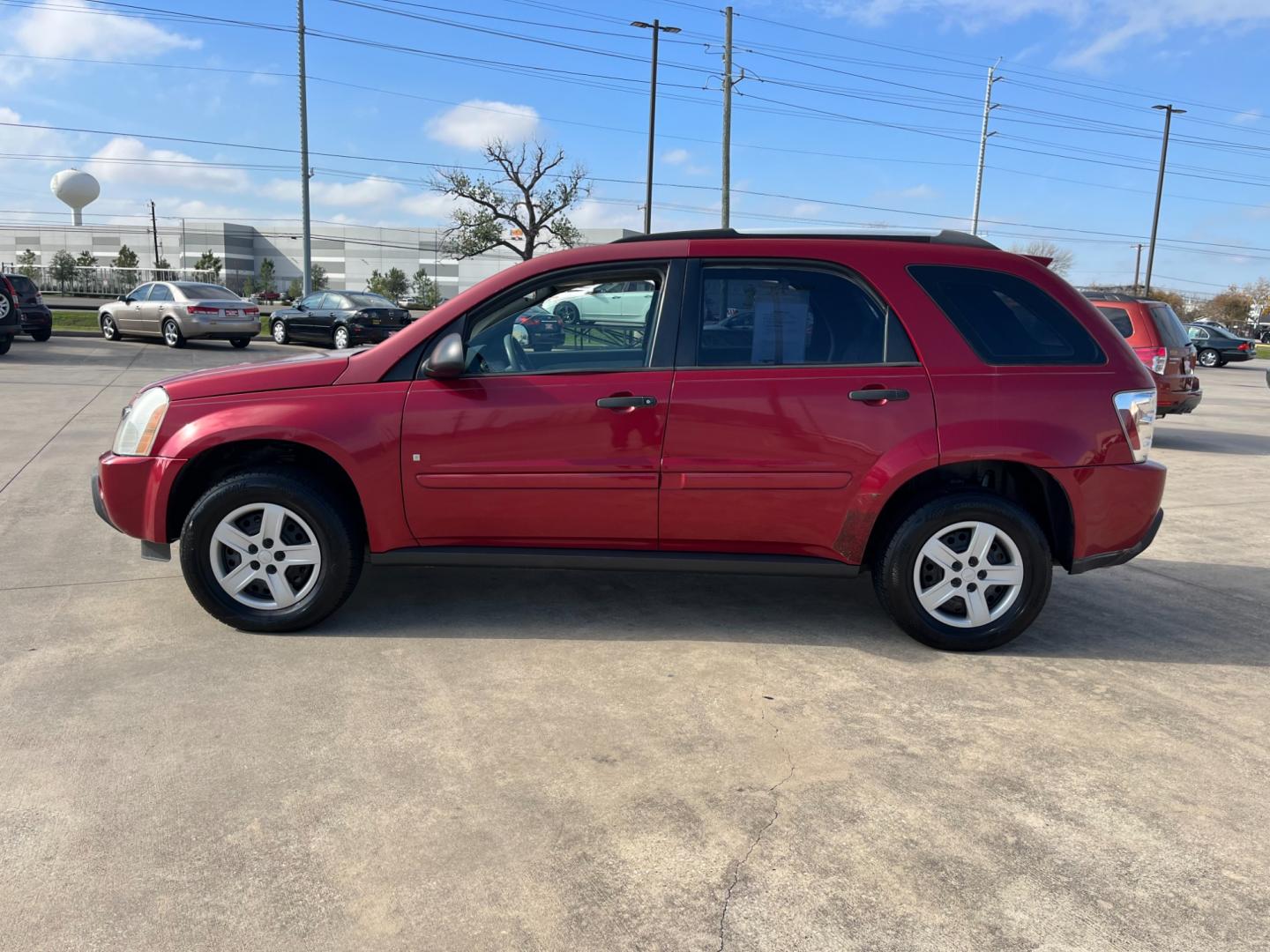 2006 red /TAN Chevrolet Equinox LS 2WD (2CNDL13F366) with an 3.4L V6 OHV 12V engine, 5-Speed Automatic transmission, located at 14700 Tomball Parkway 249, Houston, TX, 77086, (281) 444-2200, 29.928619, -95.504074 - Photo#3